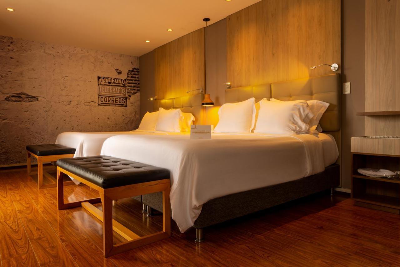 מניזאלס Quo Quality Hotel מראה חיצוני תמונה A bedroom at the hotel