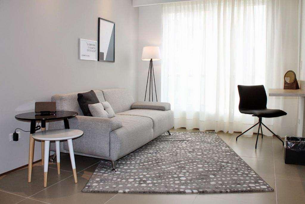 מניזאלס Quo Quality Hotel חדר תמונה A living room with a rug
