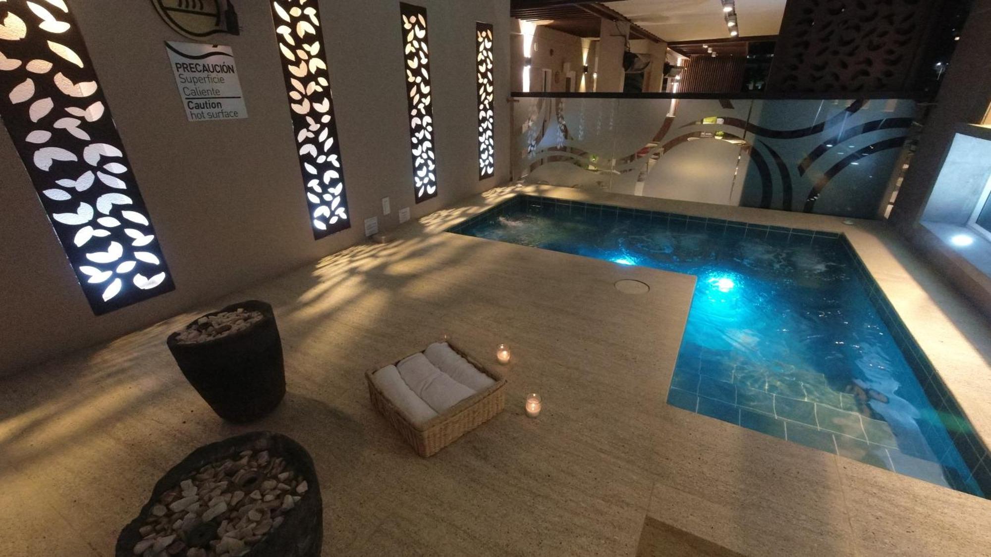 מניזאלס Quo Quality Hotel מראה חיצוני תמונה The pool at the spa