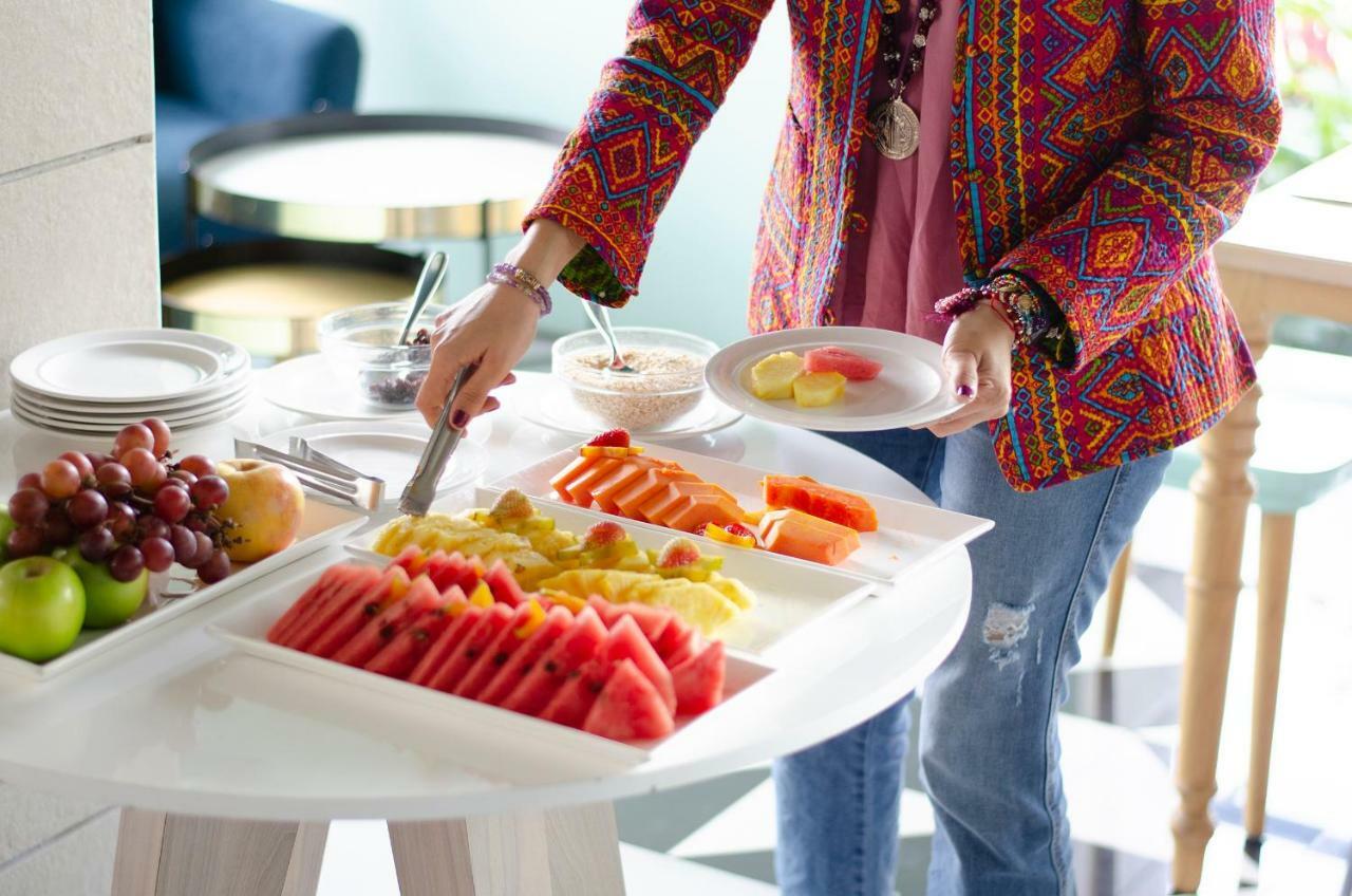 מניזאלס Quo Quality Hotel מראה חיצוני תמונה A buffet